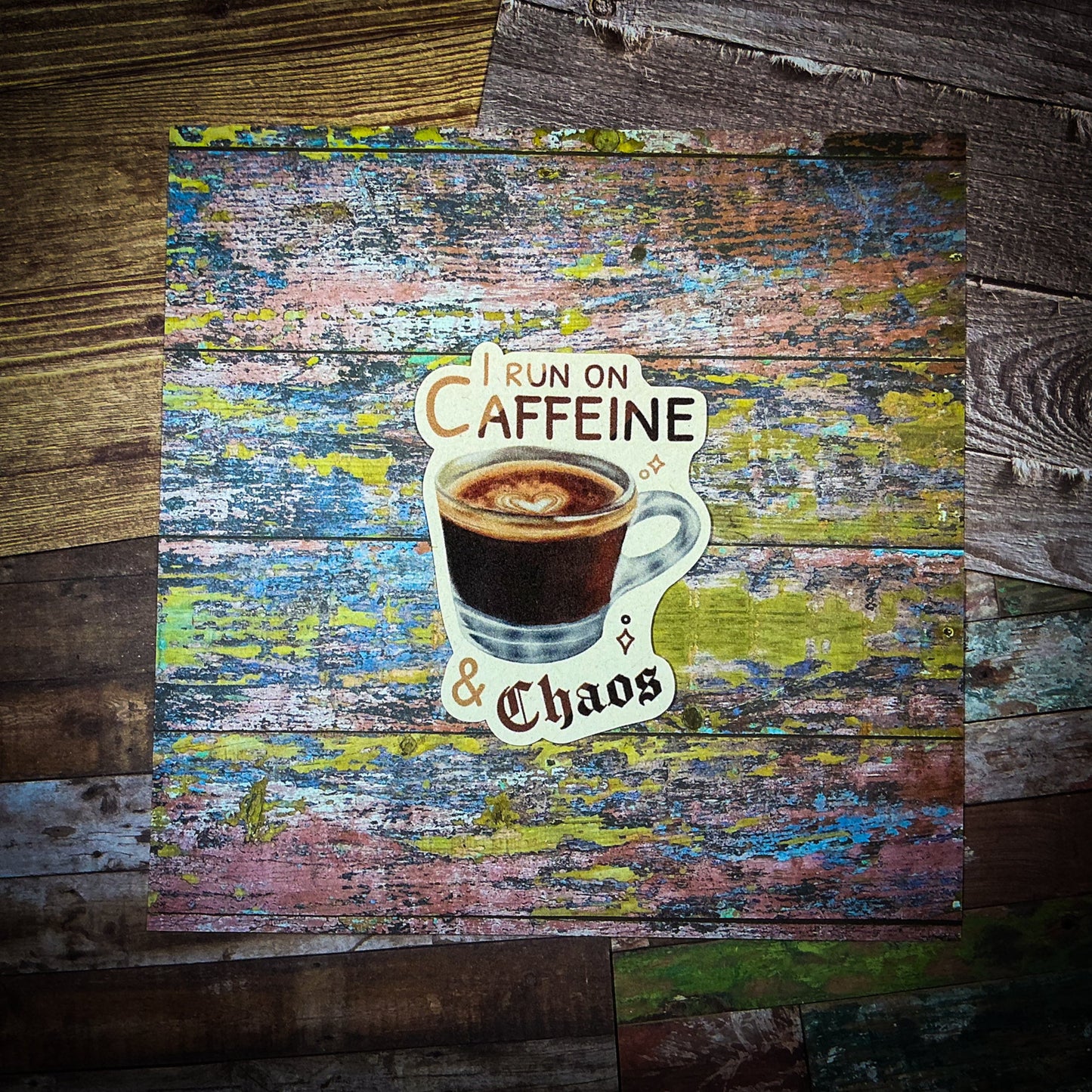 I Run On Caffeine & Chaos Die-Cut Sticker. This handmade coffee sticker features a hand drawn watercolor espresso shot with the words 'I run on caffeine & chaos'. Approximate size (WxH): 3 x 2.4 in. 100% Compostable, Biodegradable, and Recyclable. Printed with water-based ink on Compostable Natural Sugarcane Sticker Paper. Suitable for Home Compost Systems. NOT water resistant or waterproof.