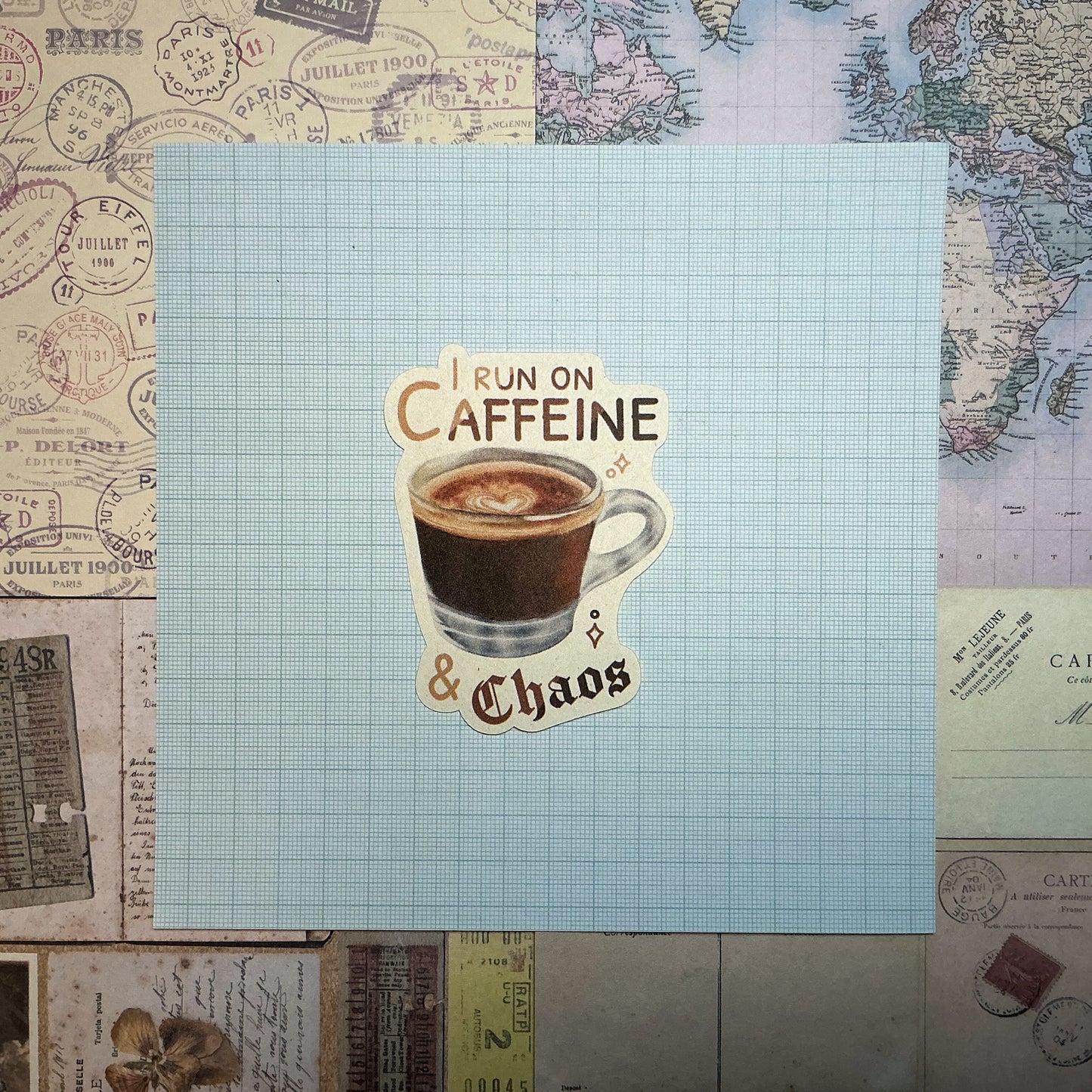 I Run On Caffeine & Chaos Die-Cut Sticker. This handmade coffee sticker features a hand drawn watercolor espresso shot with the words 'I run on caffeine & chaos'. Approximate size (WxH): 3 x 2.4 in. 100% Compostable, Biodegradable, and Recyclable. Printed with water-based ink on Compostable Natural Sugarcane Sticker Paper. Suitable for Home Compost Systems. NOT water resistant or waterproof.